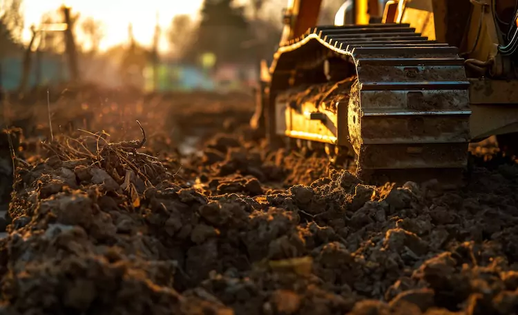 Insured earthmover operating a bulldozer